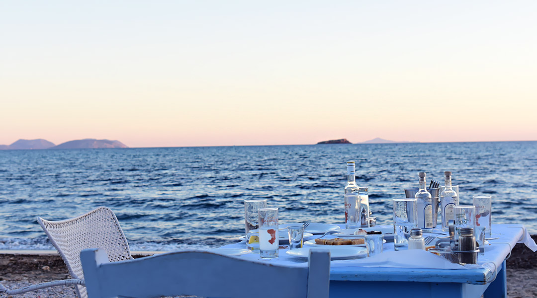 Enjoy greek ouzo by the sea at Batsi Greece